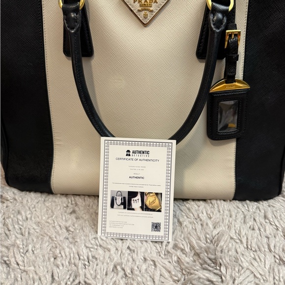 Prada Black and Cream Satchel
Saffiano Leather
Beautiful Handbag - Picture 5 of 12